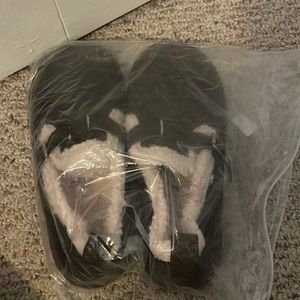 New! Chocolate colored, Sherpa lined. Would be great with jeans or leggings.